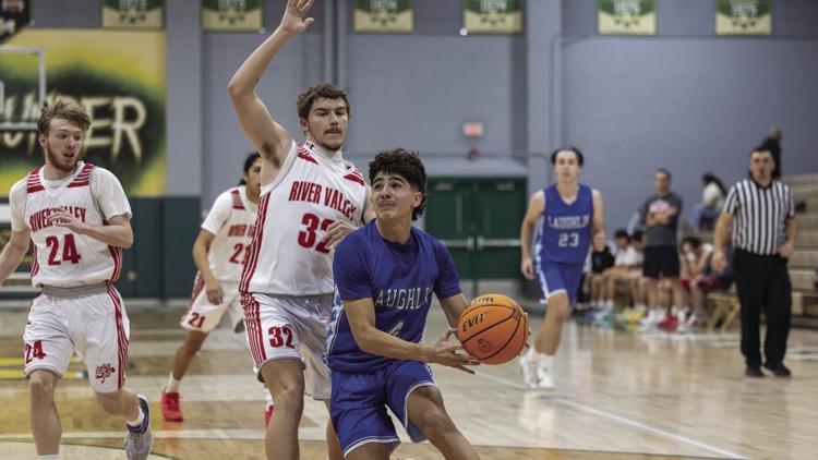 Laughlin boys basketball record first win in Holiday Basketball Shootout